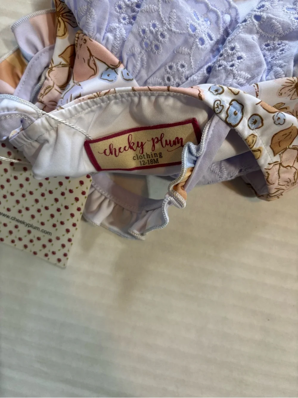 NWT cheeky plum Lilac Floral Ruffle swim top with Pastel Flowers 12/18 months